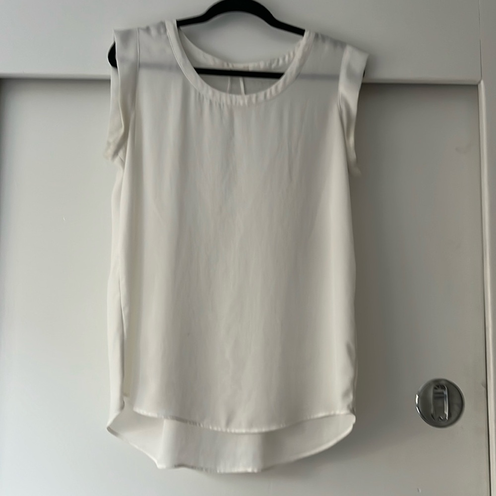 Euc pleione Anthropologie white flowy blouse